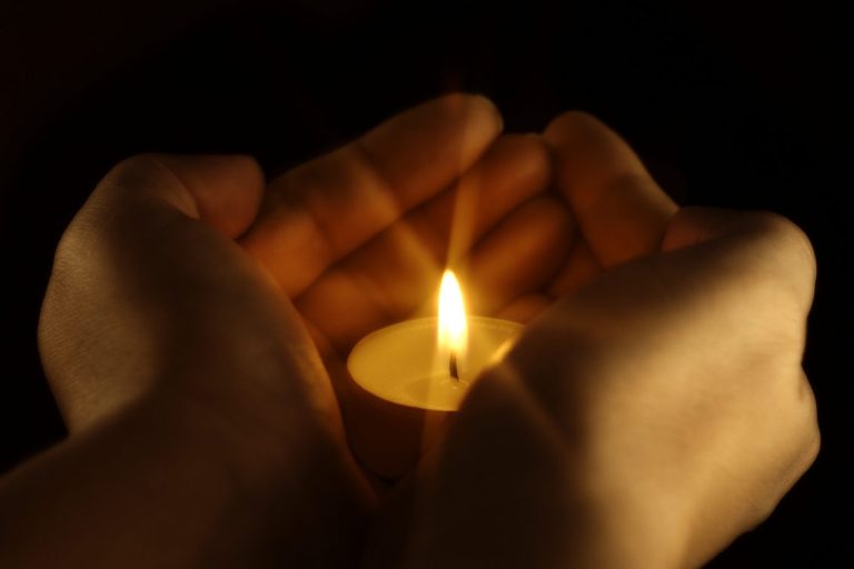 Candle symbolising the end of beloved pet's life.